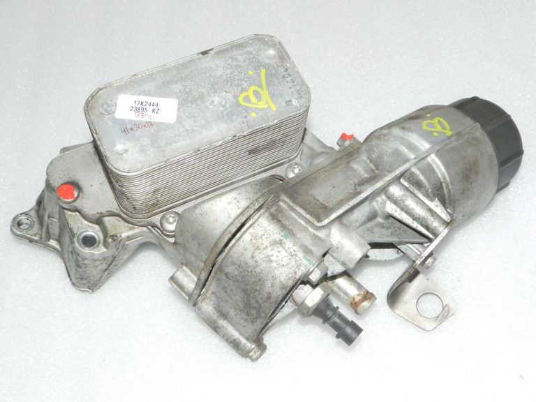 Lancia Thema II Jeep WK 3.0 CRD eļļas filtra korpuss ar dzesētāju 68504665AA 68211440AB