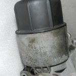 Lancia Thema II Jeep WK 3.0 CRD eļļas filtra korpuss ar dzesētāju 68504665AA 68211440AB