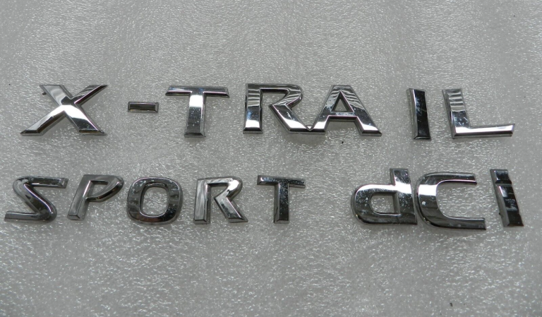 Nissan X-Trail Sport dCi Oriģinālā aizmugurējā emblēma 848951da0b 84896eq300