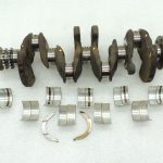 Mini Cooper One R57 R56 1.6L benzīns N12B16A kloķvārpsta 11217561273 Kloķvārpsta