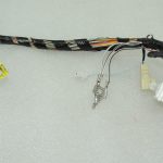 Toyota Avensis T27 interjera apakšējās virsbūves elektroinstalācijas siksna kreisā 8216105P90