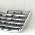 Oriģinālais Chrysler Grand Voyager V radiatora režģis 5113228AA DEFECTIVE
