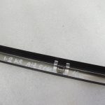 Oriģinālā Chrysler Grand Voyager V aizmugurējā sānu paneļa apdare kreisā 5020977AA
