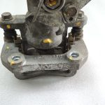 Suzuki Vitara LY 1.4i 2WD Aizmugurējais bremžu suports kreisais 55402-61M00-999