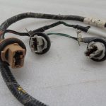 Ford Ranger P375 Aizmugurējā luktura kreisā luktura turētāja vadu instalācija AB39-13N411-AA 1744532