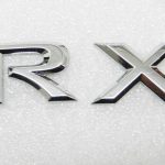 Oriģinālā Lexus RX 450h aizmugurējā vāka emblēma, plāksnītes logo 75443-48140