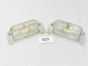 Oriģinālais Lancia Thema II 300C numura zīmes apgaismojuma korpuss, pāris 04805846AA