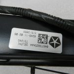 Chrysler Grand Voyager Oriģinālais bīdāmo durvju elektromotors pa kreisi