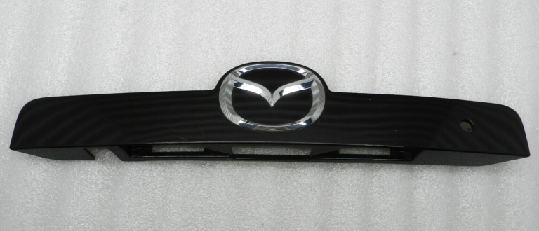 Mazda CX-7 oriģinālā bagāžnieka emblēma 34N PHANTOM PURPLE MET