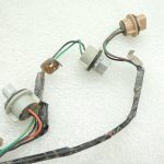 Ford Ranger P375 TKE kreisās aizmugurējās gaismas spuldzes turētājs AB39-13N411-AA