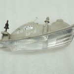 Ford Windstar priekšējais kreisais galvenais lukturis F78B13N087B