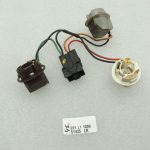 Saab 9-5 I kombi aizmugurējā apgaismojuma spuldzes turētājs kreisajā pusē 4914776