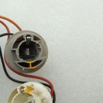 Saab 9-5 I kombi aizmugurējā apgaismojuma spuldzes turētājs kreisajā pusē 4914776