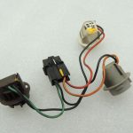 Saab 9-5 I kombi aizmugurējā apgaismojuma spuldzes turētājs kreisajā pusē 4914776