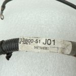 Suzuki Grand Vitara I SQ420 2.0i akumulatora spaile akumulatora vadu instalācija 3380051J01