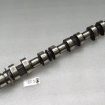 Toyota Yaris P13 1.5 16V 2NRFKE 82kw Ieplūdes sadales vārpsta 13501-47060 Sadales vārpsta