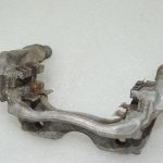 Toyota Yaris IV Aizmugurējais kreisais bremžu suporta kronšteins 47822K9000