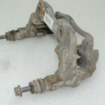 Toyota Yaris IV Aizmugurējais kreisais bremžu suporta kronšteins 47822K9000