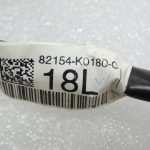Toyota Yaris IV 1.5 HEV 68kW Aizmugurējo durvju elektroinstalācijas siksna aizmugurējā kreisā 82154K0180