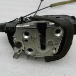 Nissan X-trail T31 Oriģinālā aizmugurējā labā durvju slēdzene 82500JG000