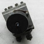 VW Passat oriģinālais ABS vadības bloka sūknis