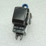 Oriģināls Nissan Navara II 4×4 aizmugurējā elektriskā stikla slēdzis 254111J60A