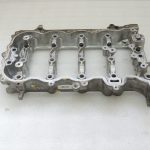 Toyota Yaris P13 1.5 16V 2NRFKE 82kw Sadales vārpstas korpuss 1110347903