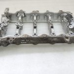 Toyota Yaris P13 1.5 16V 2NRFKE 82kw Sadales vārpstas korpuss 1110347903