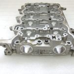 Toyota Yaris P13 1.5 16V 2NRFKE 82kw Sadales vārpstas korpuss 1110347903