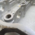 Toyota Yaris P13 1.5 16V 2NRFKE 82kw Sadales vārpstas korpuss 1110347903