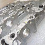 Toyota Yaris P13 1.5 16V 2NRFKE 82kw Sadales vārpstas korpuss 1110347903