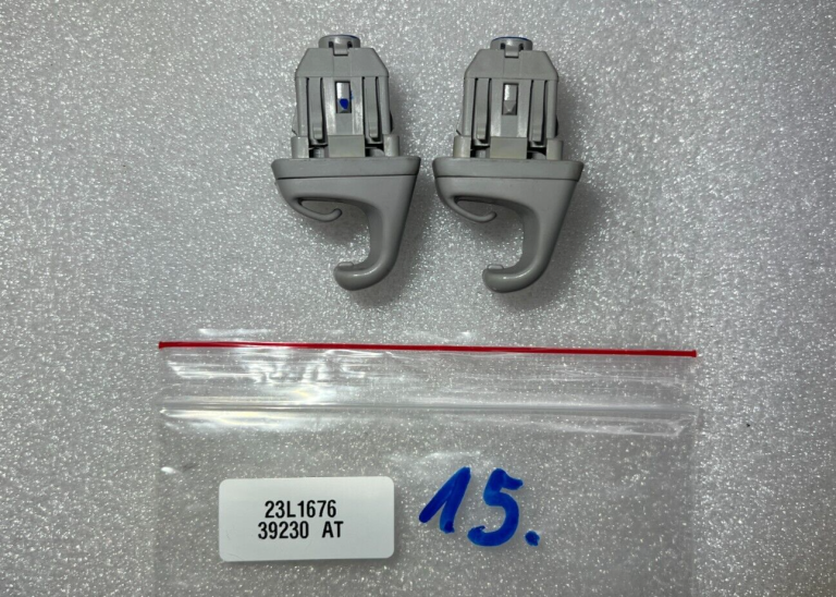 Toyota Yaris P13 oriģinālais saules aizsarga turētājs kreisais labais 7434833040B1