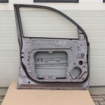 Nissan X-Trail T31 priekšējās kreisās durvis priekšējās kreisās durvis K55 brūngani pelēks met.