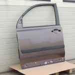 Nissan X-Trail T31 priekšējās kreisās durvis priekšējās kreisās durvis K55 brūngani pelēks met.
