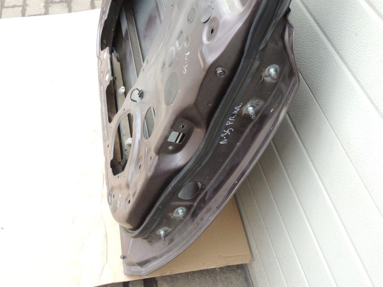 Nissan X-Trail T31 priekšējās kreisās durvis priekšējās kreisās durvis K55 brūngani pelēks met.
