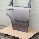 Nissan X-Trail T31 Aizmugurējās labās durvis Aizmugurējās labās durvis K55 Brūngani pelēks met.