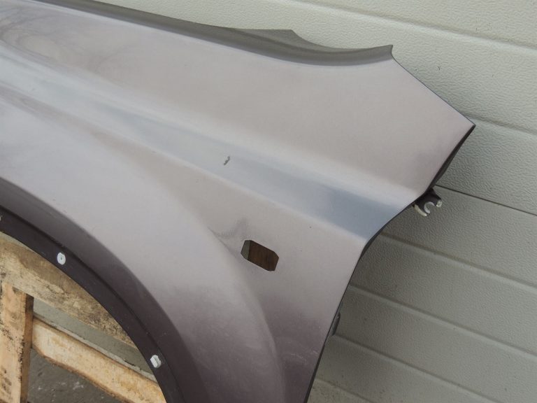 Nissan X-Trail T31 priekšējais kreisais dubļusargs kreisais spārns K55 Brownish Grey Met
