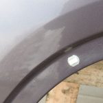 Nissan X-Trail T31 priekšējais kreisais dubļusargs kreisais spārns K55 brūngani pelēks Met defekts