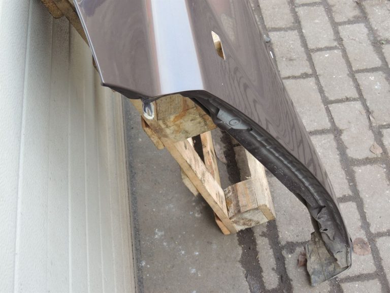 Nissan X-Trail T31 priekšējais kreisais dubļusargs kreisais spārns K55 brūngani pelēks Met defekts