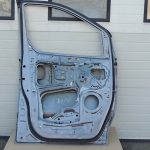 Hyundai H1 i800 TQ priekšējās kreisās durvis Krāsa NDA – Pelēka TITANUM Priekšējās kreisās durvis