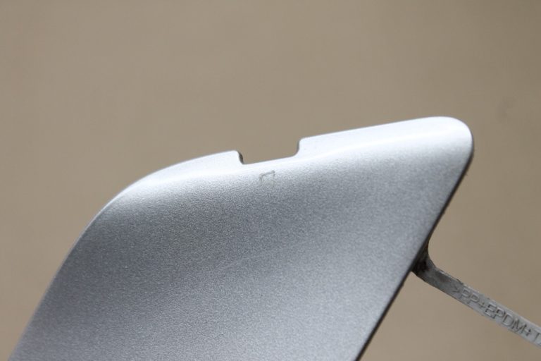 Opel Astra J Hečbeks aizmugurējā bampera velkoņa vāciņš Argon Silver 13266588