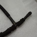 Mazda CX7 2007 Priekšējo lukturu mazgāšanas sprauslu vadu instalācija Priekšējo lukturu mazgāšanas caurules