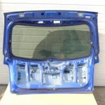 Mazda CX7 I MK1 aizmugurējā durvju apakšējā bagāžnieka vāka krāsa 34J Aurora Blue Mica