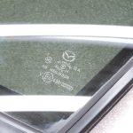 Oriģināls Mazda 6 GJ/GL sānu loga aizmugurējais kreisais trīsstūrveida logs