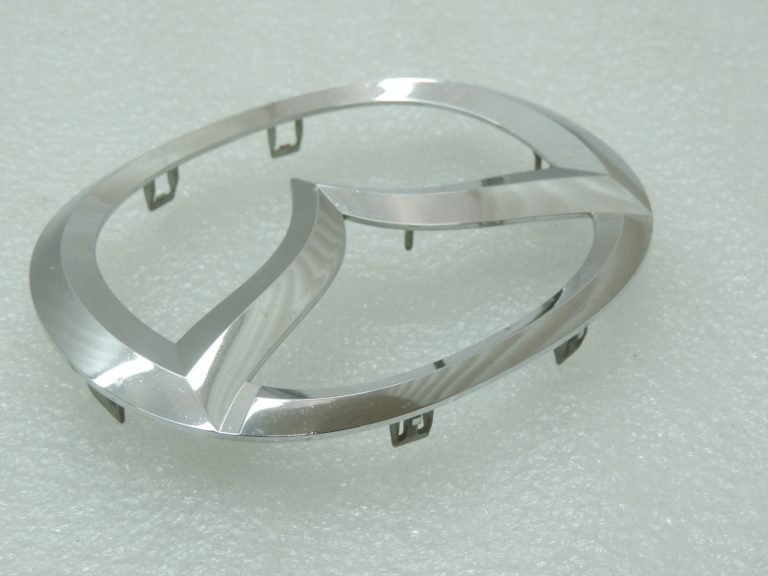 Oriģinālā Mazda 6 GJ priekšējā radiatora režģa emblēma Mascot GHP951731, GHP9-51-731