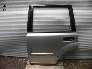 Nissan X-Trail Aizmugurējās kreisās durvis Aizmugurējās kreisās durvis Krāsa KY0 sudraba metālisks DEFEKTĪVS