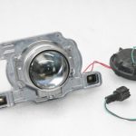 Nissan X-Trail T31 ksenona lukturu lēcas atstarotājs kreisais 26060JG45A