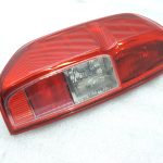 Oriģināls Nissan Navara II (D40) facelift aizmugurējais kreisais lukturis 26555EB38B