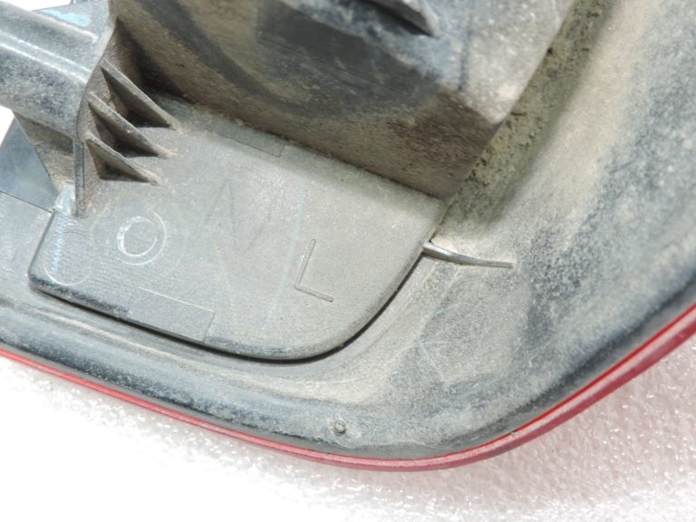 Oriģināls Nissan Navara II (D40) facelift aizmugurējais kreisais lukturis 26555EB38B