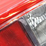 Oriģināls Nissan Navara II (D40) facelift aizmugurējais kreisais lukturis 26555EB38B